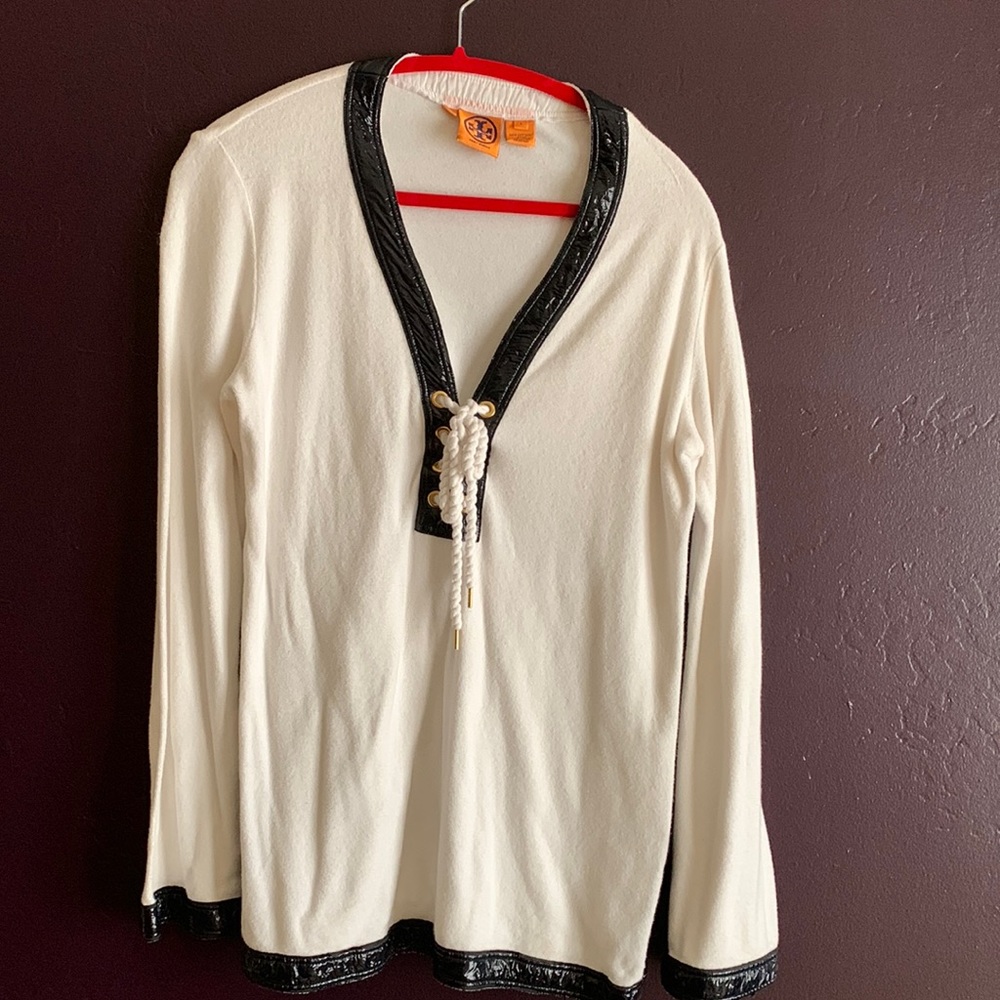 Tory terry tunic with faux leather trim and rope closure.